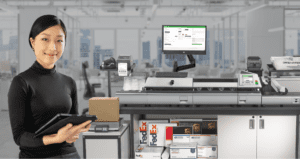 woman standing in front of an Quadient ix-90 mailing system with SMART software